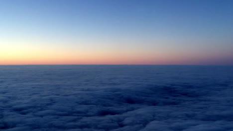 Sunrise-and-clouds,-view-from-a-plane-2