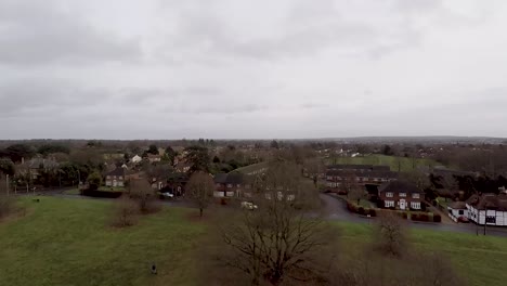 An-overhead-shot-over-a-small-English-country-village-on-a-cold-winter-day-4