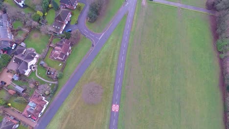 An-overhead-shot-over-a-small-English-country-village-on-a-cold-winter-day-2