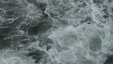 Slightly-turbulent-waters,-shot-from-above
