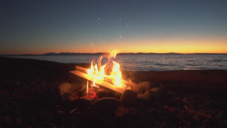 SLOW-MOTION:-Bonfire-on-a-Vancouver-Beach-at-Sunset-4K