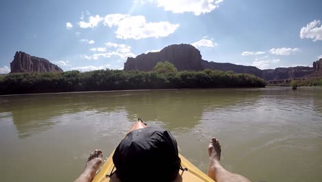 First-person-view-in-kayak-floating-on-river-in-Utah