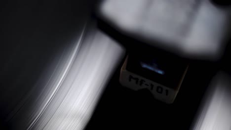 Close-up-of-vinyl-record-player-in-light
