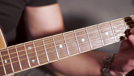 Close-up-shot-of-playing-on-acoustic-guitar