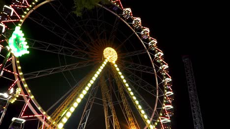 Ferris-wheel-at-amusement-park-,-night-shot