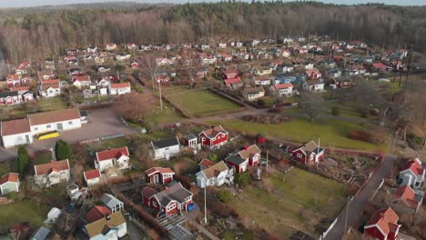 Aerial-footage-of-some-beautiful-picturesque-cottages-in-Delsjon,-Gothenburg,-Sweden-1