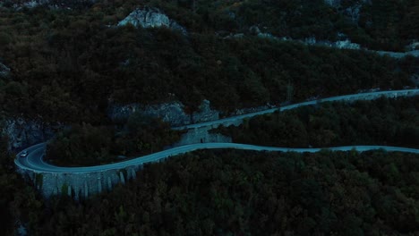 Aerial-medium-shot-of-mountain-road-after-sunset-8