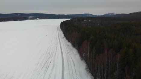 Aerial-footage-over-Indalsalven-located-in-Timra,-Sundsvall,-Sweden