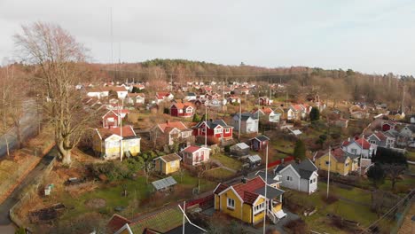 Aerial-footage-of-some-beautiful-picturesque-cottages-in-Delsjon,-Gothenburg,-Sweden-5