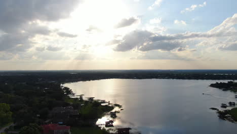 Beautiful-Pan-Across-Florida-Lake-Homes-in-the-Evening-Near-Dusk