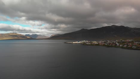 Aerial-footage-showing-the-small-town-called-grundarfjordur-located-in-Iceland-very-close-to-mount-kirkjufell-2