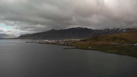 Aerial-footage-showing-the-small-town-called-grundarfjordur-located-in-Iceland-very-close-to-mount-kirkjufell-1