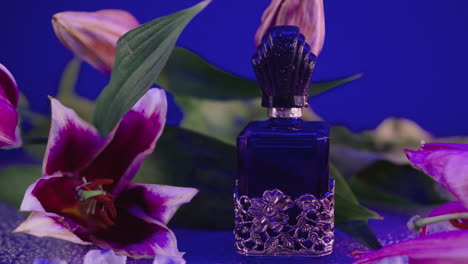 Close-up-zoom-in-to-a-vintage-blue-fragrance-bottle