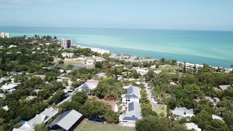 Slow-Flyover-of-Siesta-Key-Florida-towards-the-turquoise-gulf-water
