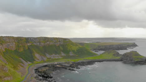 Aerial-footage-of-Northern-Ireland's-coastline-on-a-cloudy-day