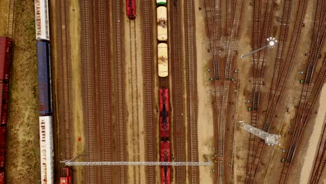 Aerial-view-of-colorful-freight-trains-with-goods-on-the-railway-station-1