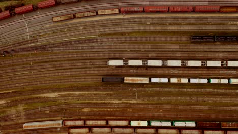 Aerial-view-of-colorful-freight-trains-with-goods-on-the-railway-station-2