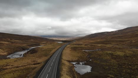 Aerial-footage-showing-road-1-up-in-the-mountains-of-Iceland