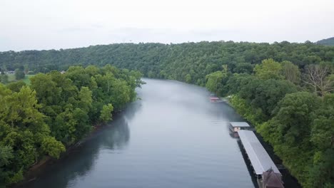 Drone-footage-hovering-over-a-foggy-river