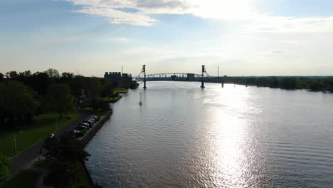 Pan-over-Delaware-River-and-Bridge-during-sunset