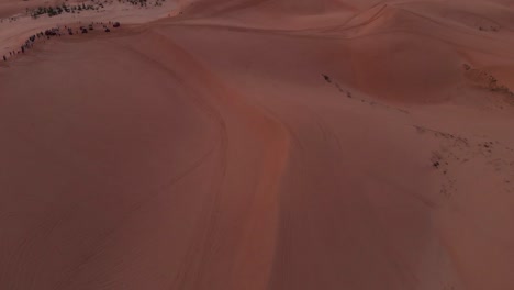 Cinematic-aerial-drone-shot-of-golden-sunrise-over-the-remote-sand-dunes-of-vietnam-with-untouched-sand-and-cloudy-sky-6