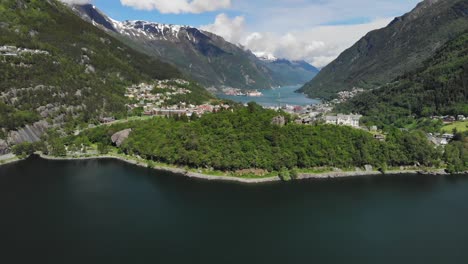 Aerial-dolly-shot-of-a-beautiful-small-town-of-Odda-in-Norway-during-the-summer