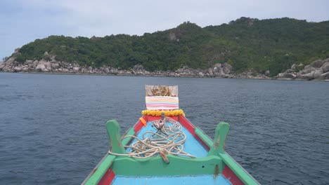 On-board-view-of-Thai-long-tail-boat-moving-among-the-mountain,-Koh-Tao-island,Thailand
