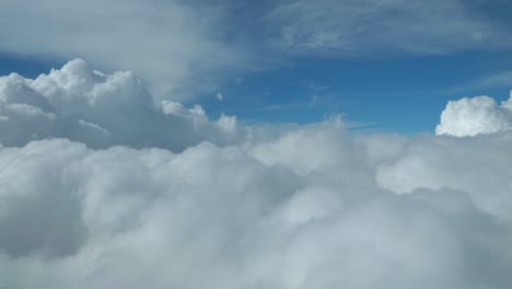 Airplane-flying-in-to-the-clouds-view-from-cockpit