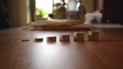 Moving-shot-of-some-stacked-coins-1