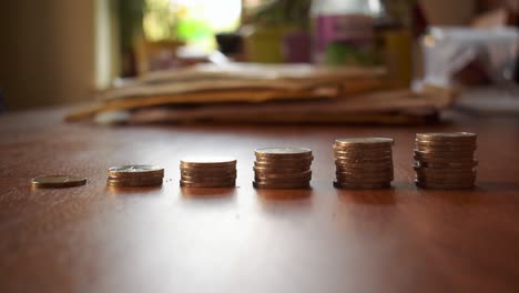 Moving-shot-of-some-stacked-coins-2