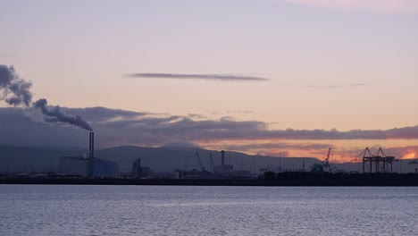 Evening-view-of-industrial-site-at-Dublin-Bay,-Ireland