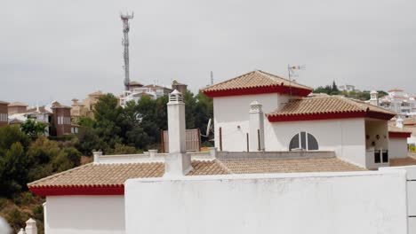 Slow-motion-trucking-shot-of-typical-Mediterranean-rooftops-in-Spain
