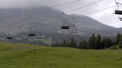 Chairlift-in-ski-resort-getting-rained-on-during-summer