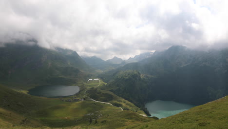 Landscape-pan-showing-the-beautiful-mountains-and-lake-Ritom-in-the-middle-of-Swiss-Alps
