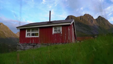 A-red-small-house-in-the-mountains
