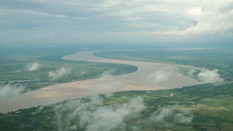Aerial-view-of-beautiful-river,-clouds-and-land