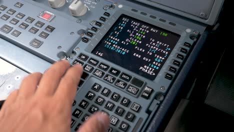 Hand-of-pilot-inputs-flight-parameters,-Preparing-the-aircraft