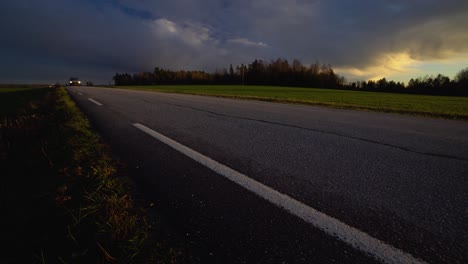 Car-passing-by-in-the-sunset.-Quick-pan