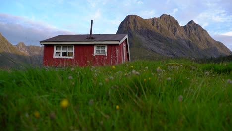 A-red-small-house-in-the-mountains-1