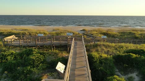 Starting-on-the-boardwalk-and-rising-up-to-a-view-of-the-beach-and-ocean