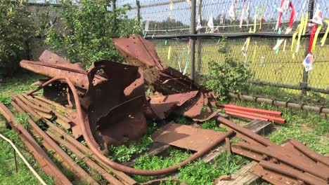 The-wreckage-of-a-train-bombed-during-the-Korean-war-displayed-at-Imjingak-by-the-DMZ-overlooking-North-Korea,-in-Munsan,-Paju,-Gyeonggi-do,-South-Korea