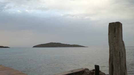 A-view-of-an-islet-in-the-Ibiza-coast-on-a-cloudy-day