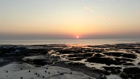 Sunrise-hyperlapse-over-Jersey-Harbour-filmed-by-drone