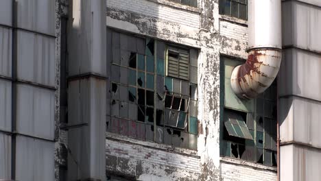 Broken-Windows-of-an-Industrial-Building-in-Detroit,-Michigan