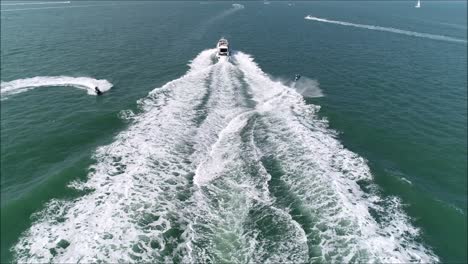 Jetski-jumping-over-a-motorboat-wake-1