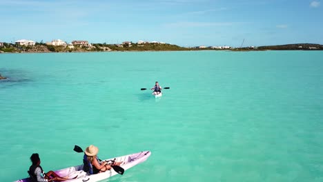 Kayaker-exploring-the-ocean-off-coast-of-Providenciales-in-the-Turks-and-Caicos-archipelago