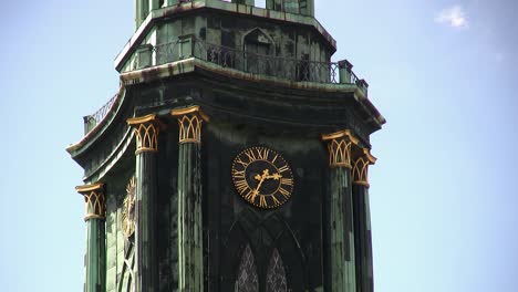 Close-up-of-bell-tower-of-Marienkirche-in-Berlin-near-Alexanderplatz,-Germany