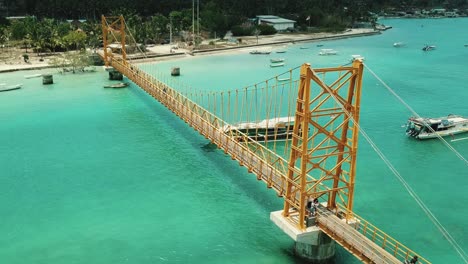 Orbiting-drone-shot-of-the-Yellow-Bridge-in-Nusa-Lembongan