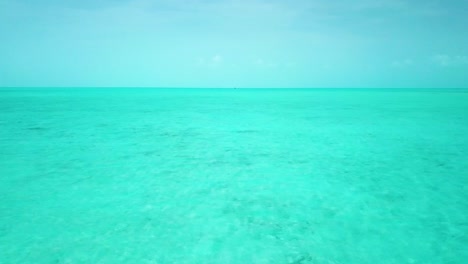 Crystal-clear-ocean-water-off-the-coast-of-Providenciales-in-the-Turks-and-Caicos-archipelago