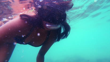 SLOW-MOTION-|-Indian-girl-snorkeling---swimming-looking-for-tropical-fish